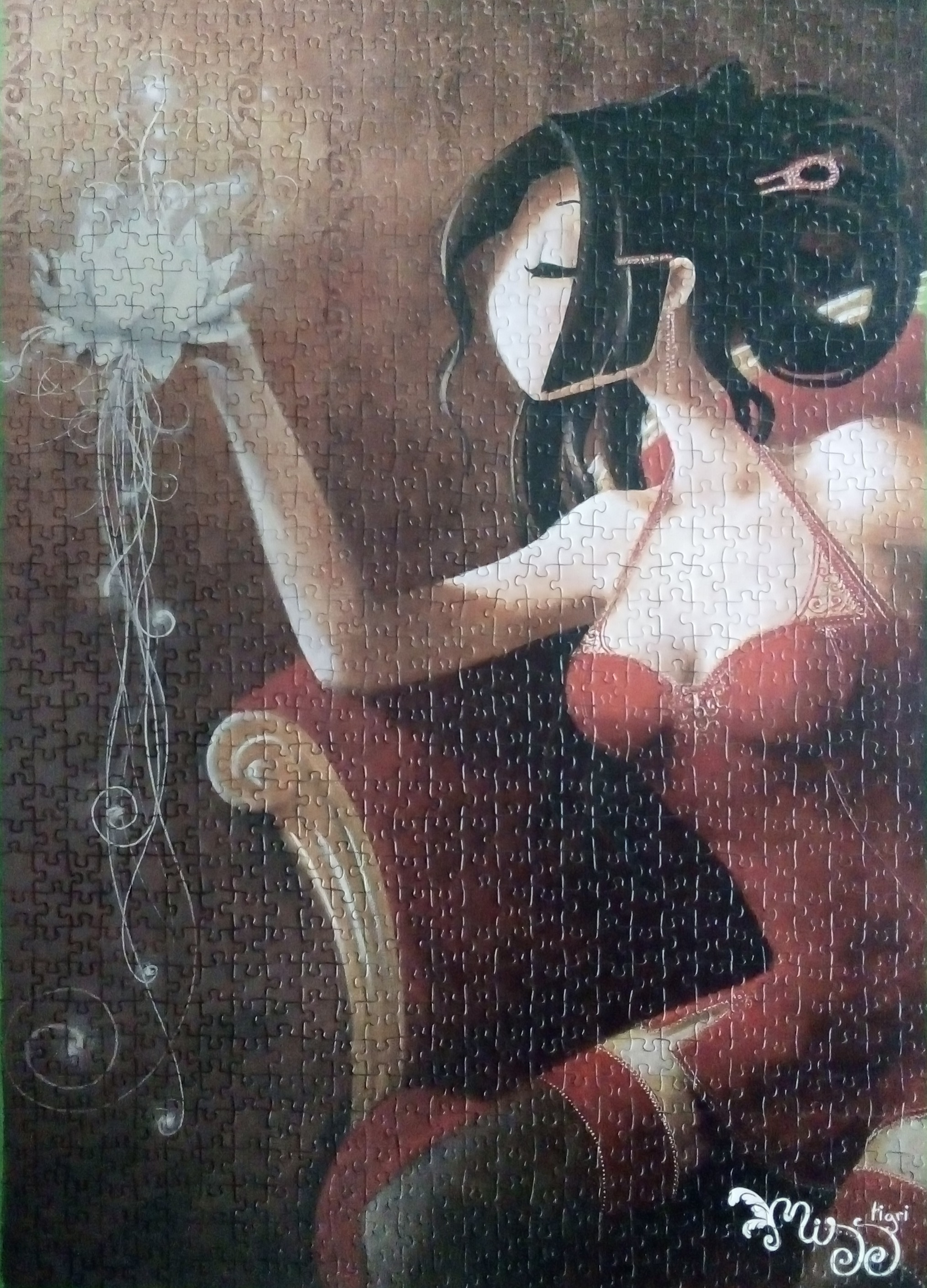 puzzle représentant une jeune femme tenant un nénuphar